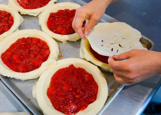 Making strawberry pies